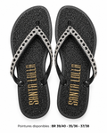 Paire de savates Santa Lolla noires pailletées sur fond blanc